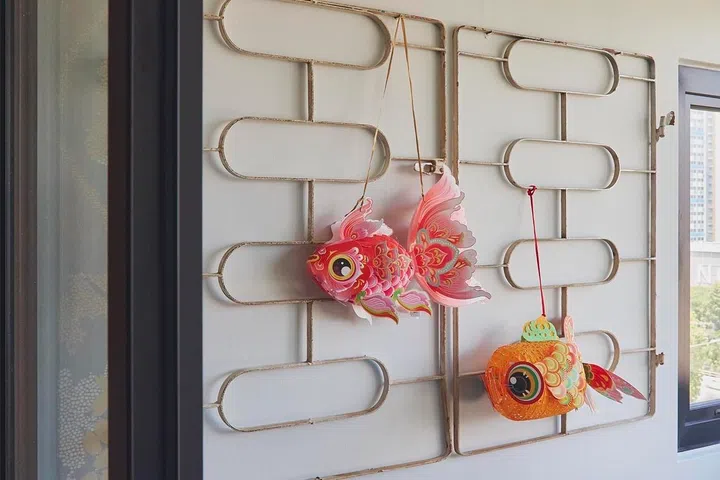 A pair of colourful fish lanterns brings a playful touch to Ivan’s balcony retreat, a space he created to introduce more greenery, fresh air and quiet moments into his daily routine.