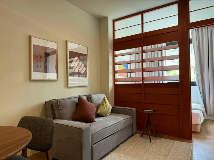 My living “room” within my 1-bedroom suite in Alma House New Bahru.