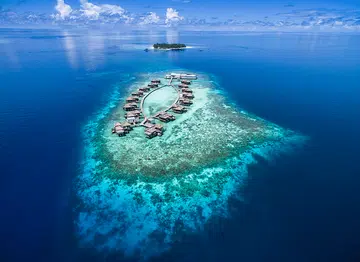Aerial view of the Raffles Maldives Meradhoo, located on the Gaafu Alifu Atoll – one of the world’s largest and most remote island atolls.