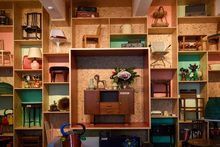 Second-hand goods dealer Hock Siong &amp; Co’s warehouse features furniture styled and displayed in eye-catching ways. Following a two-month-long renovation project in May 2018 to refresh the warehouse, it now has a floor-to-ceiling shelf with an “Instagram wall”, where furniture pieces are styled, photographed and displayed in an eyecatching way.