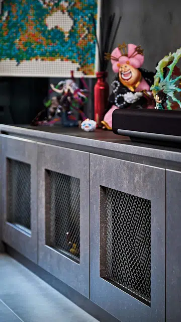 Weathered-looking TV console in flight attendant Kenny Shoo’s  3-room HDB flat at Tampines Street 41.