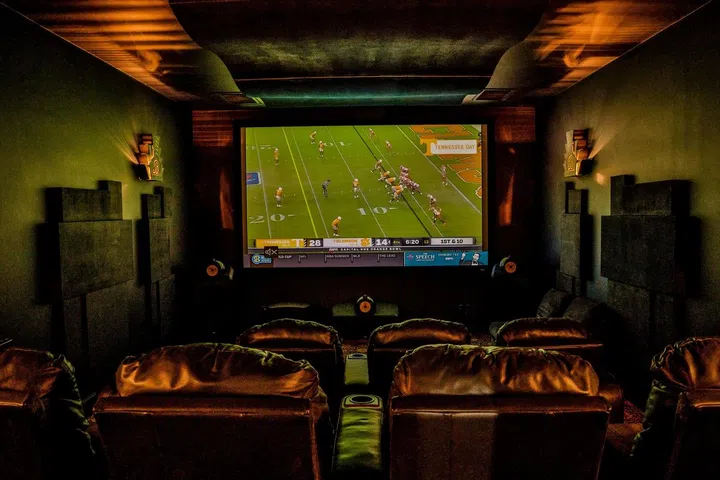 The home theater has seats for eight.