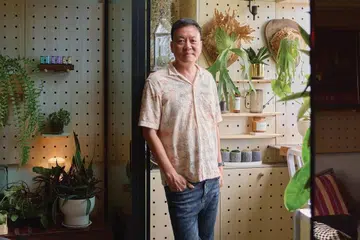 Architect and interior designer Winston Lim (of Winstudio) poses for a photograph in his 3-room HDB in Pasir Ris.