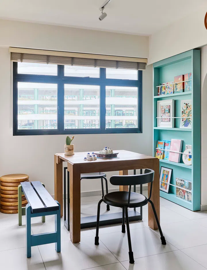 The extendable dining table in the expanded dining area, perfect for hosting game nights and gatherings.