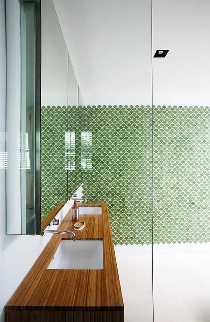 The wooden vanity counter lends rustic charm to the master bath. Bathroom accessories from Howards Storage World. (Reno: $250K excluding furniture)