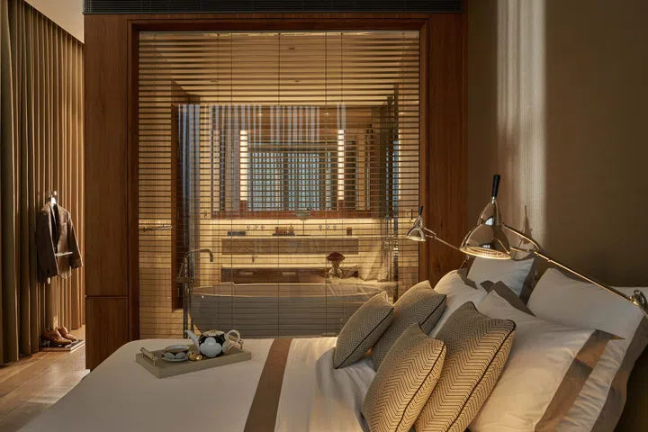 The master bedroom is no less decadent, featuring the same neutral hues and details such as the Technolumen Wall Lamp which was designed by Wilfred Buquet in 1927.