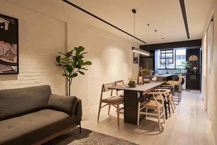 The nett height of Aiken Chia's 3-room HDB resale home is 2.4m, which is best kept uncluttered to maintain that overall spatial airiness.