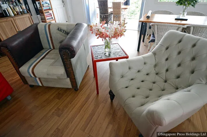 Chairs in the living room of local actress-host Cynthia Lee MacQuarrie's rented 1,400 sq ft walk-up apartment in Chip Bee Gardens. She bought these seats at a furniture fair.