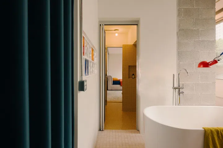 The Master Bathroom is playful yet serene with a separate shower and bath area.
