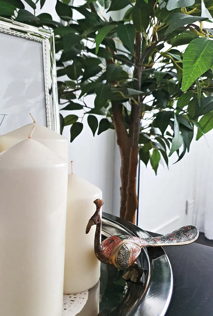 TC takes pleasure in making pretty vignettes with her eclectic decor collection.