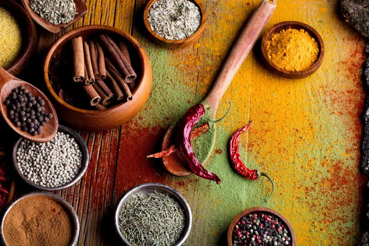 Spices and herbs on the kitchen table. 