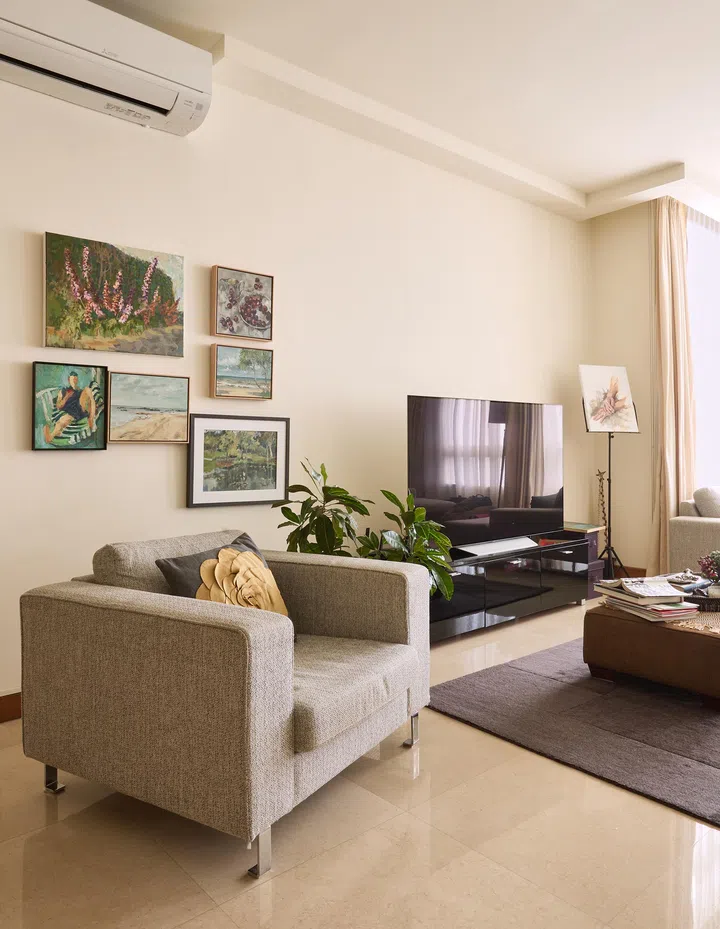 A relaxed and inviting living space with layered textures, neutral tones, and family-centered décor.