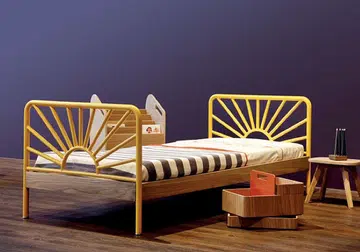 Yellow bed frame with graphic stripe bedsheets by Italian contemporary kids furniture brand, Sand Furniture Italy
