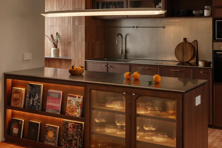 Stainless steel clad the kitchen island countertop.