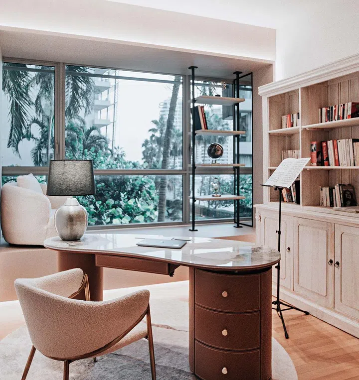 The study is furnished sparingly to ensure a spacious feel.