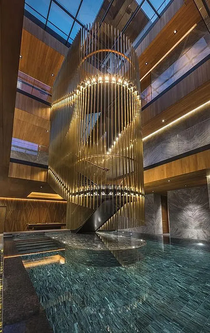 A grand staircase with lights