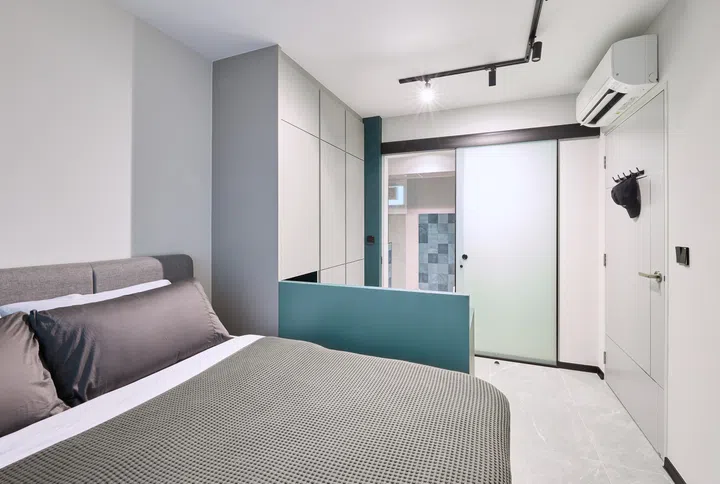 A restful view from the bed in Duncan Chew’s master bedroom, with muted tones and clean lines.