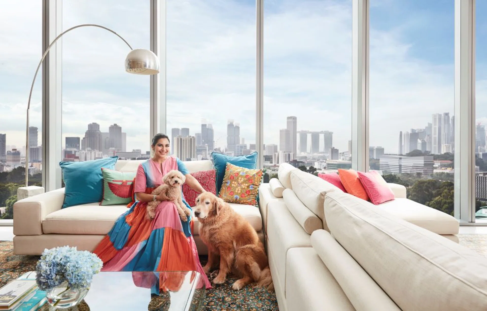 Marjhan Kausar sitting on King Living Jasper sofa