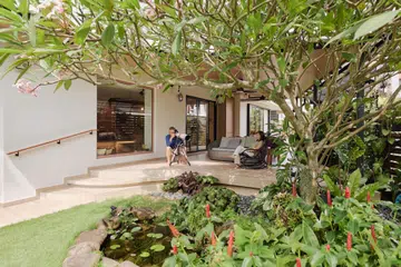 The couple behind Cellini designed their semi-detached home around three generations of family, with a picture window that frames the heart of everyday life.