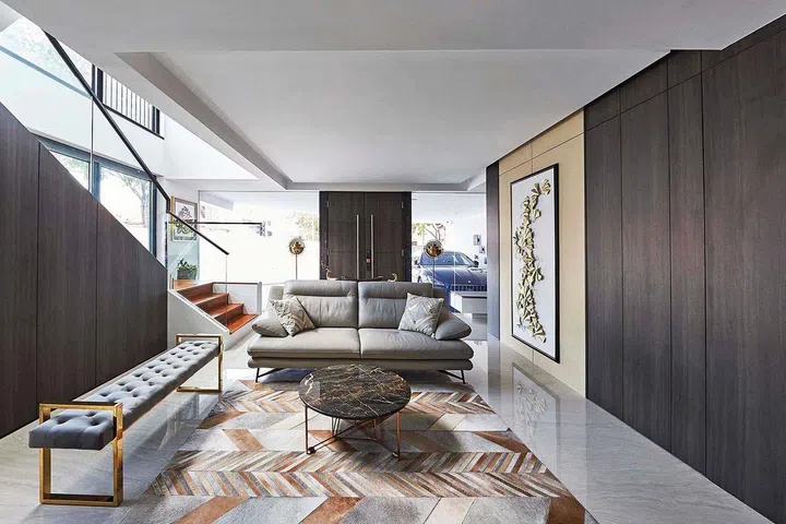 Living room in a 4-storey terrace house in Telok Kurau for the 3-generation Kareem family of five.