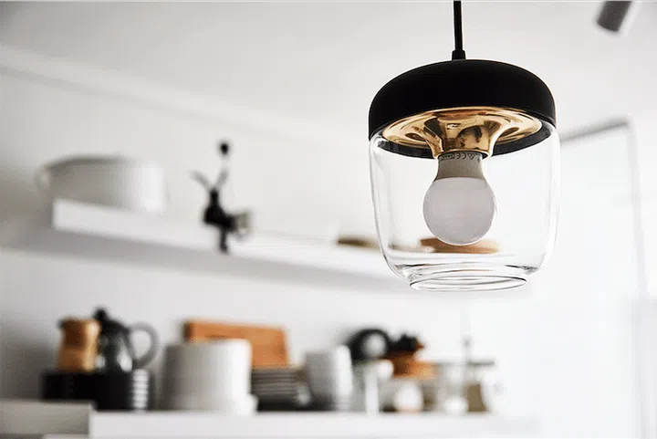 These industrial-inspired, exposed-bulb pendant lamps were bought from a German online lighting store.