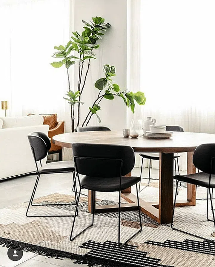 Round dining table modern black and white set up