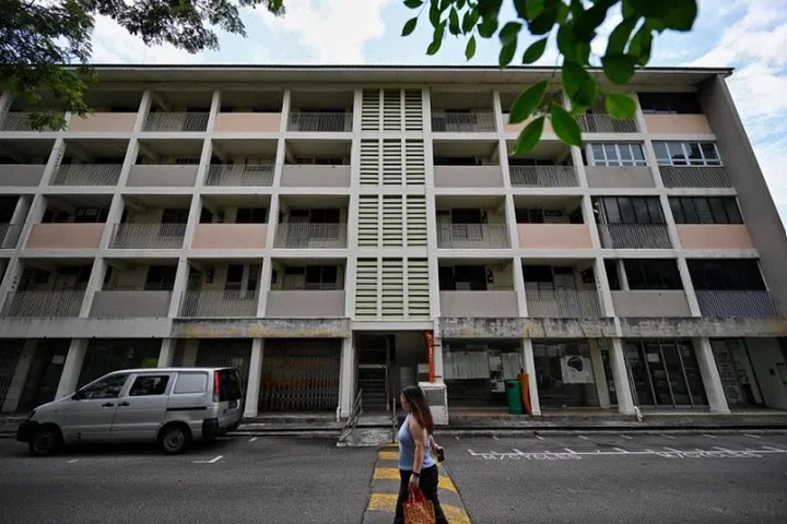 At the point of completion, blocks 1 to 4 comprised 119 flats, 10 shop units and a clinic. Some of the former shop units can be seen on the ground floor of Block 1.