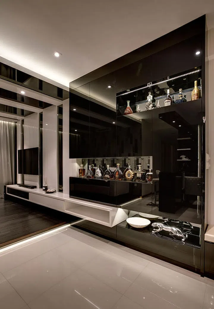 Sleek modern black and white TV console in a 3-bedroom condominium apartment along Yio Chu Kang Road, for a family of four.