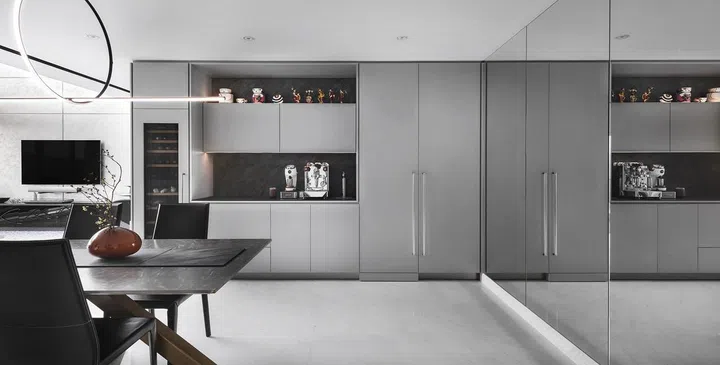 Home bar with fridge and wine chiller in this 2-storey penthouse in Bukit Timah.