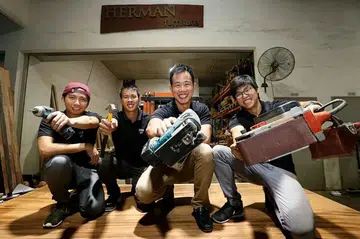 Herman Furniture team poses for a photo. Photo Business Times