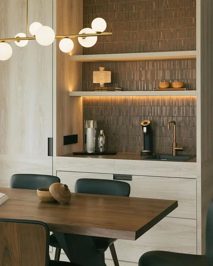 “KitKat” tiles in the pantry lend warmth, texture, and interest to this small but significant area of this 4-bedroom condominium home in The Serenade @ Holland. (Photo: Finbarr Fallon, courtesy of Parenthesis Studio)