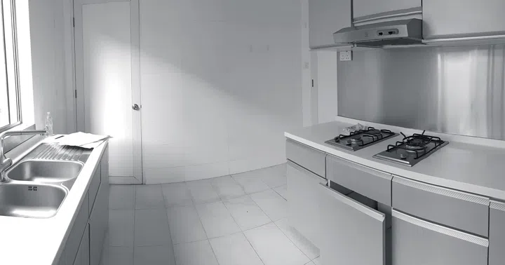 Kitchen before renovation in a 3-bedroom condo in East Coast.