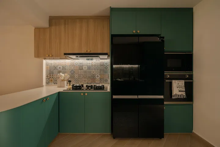 Emerald cabinetry, warm woodgrain and patterned tiles bring Ayu’s Moroccan vision to life, with thoughtful details that Amir and designer Zee refined together along the way.