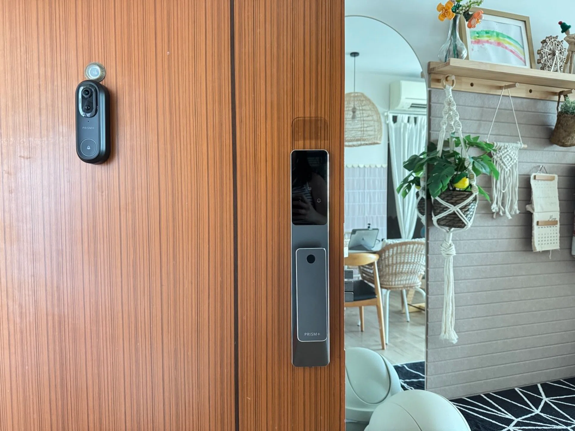 PRISM+ Smart Door Lock with video doorbell in a HDB home.