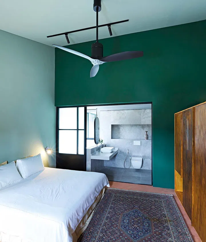 The wardrobe in the guest room is designed with wheels to allow the flexibility of moving it according to the guest’s needs.