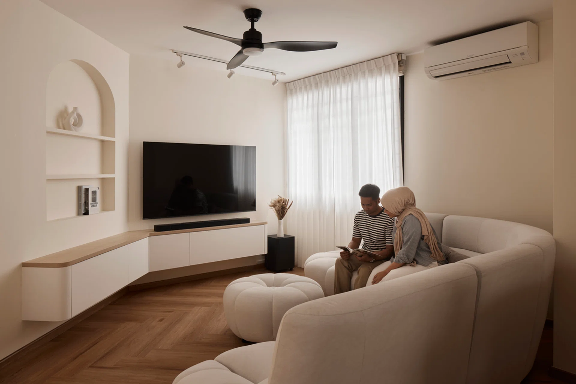 Young couple Fikri, Assistant Station Manager at SMRT, and Asyiqin, Senior HR Specialist at a law firm—both 28, their 2-year-old son, and helper lives in this 4-room resale HDB flat in Choa Chu Kang (1,119 sq ft). Designed by Jeremy Tan from RENOSTUD.IO.