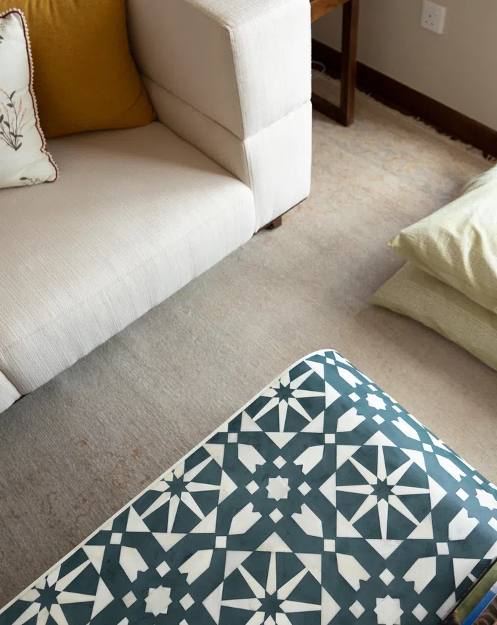 “We discovered small details, like rugs, frame the different spaces and define the living room. If we have no walls such as this for the open concept vibes, it helps to define these areas,” says the homeowner. 