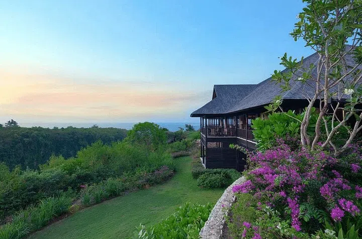 Raffles Bali Review Price from $1,670 per night. Forested view from the villa walkways and sunset in the horizon