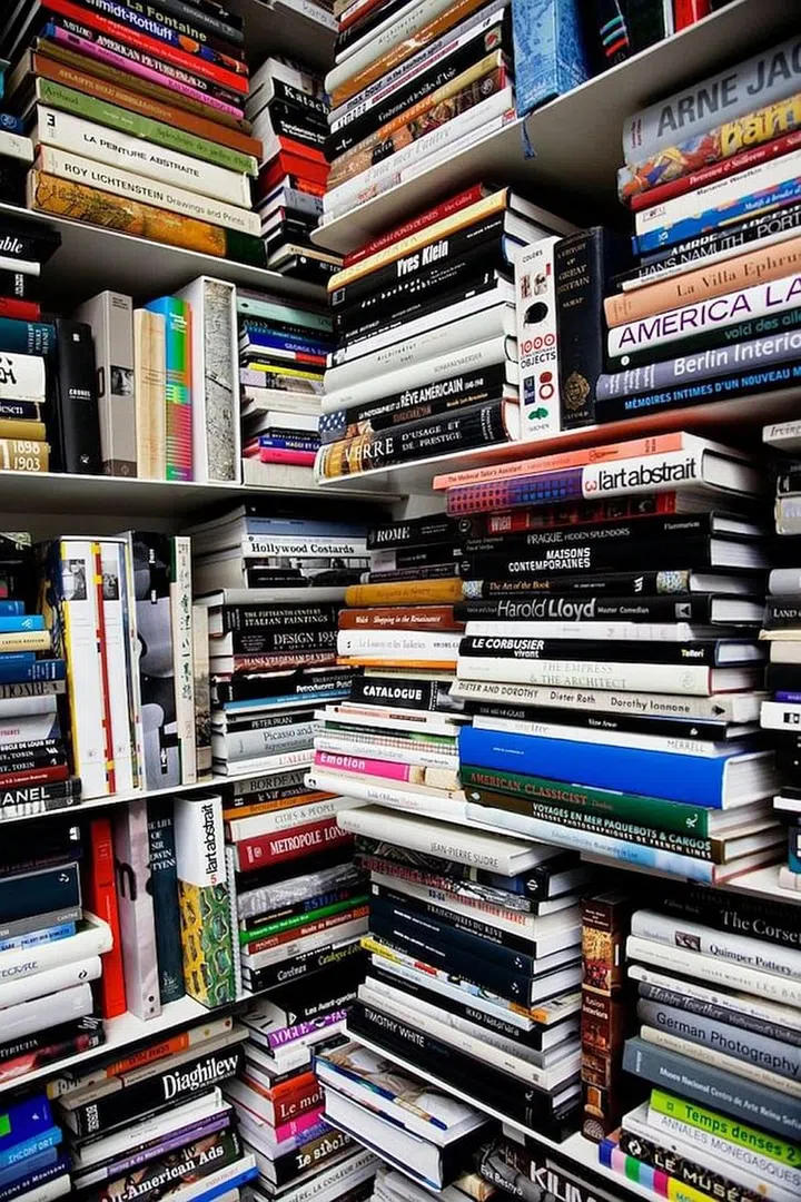 Getting to the book he wants may be a problem for Karl Lagerfeld if he was alone in the room.