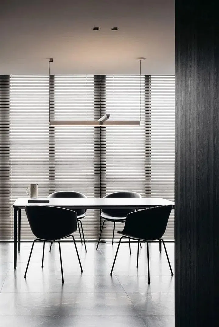 To offset the apartment’s dark colour palette, one of interior designer Joey Khu’s strategies was to use furniture with thin, almost skeletal profiles.