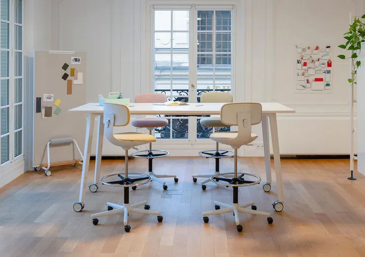 Working in a pleasant home office environment and using functional and ergonomic furniture can help boost productivity. 