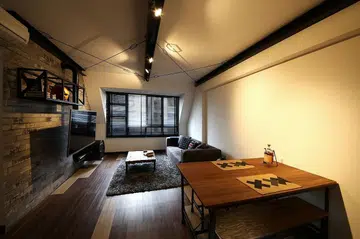 Living room in an Industrial-style 4-room HDB flat in Punggol.