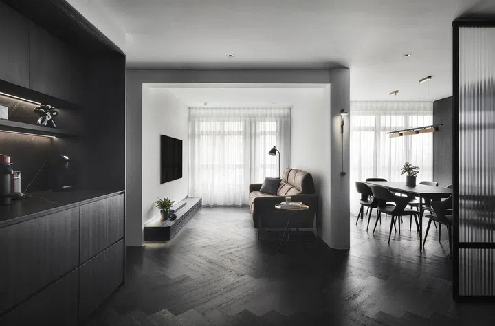 A bachelor in the investment industry's all-black 4-room HDB in Punggol.