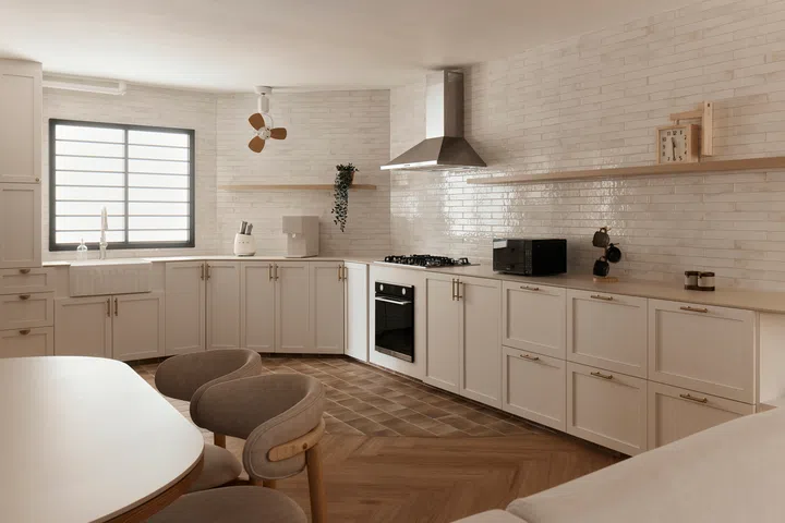 Hacking the original storeroom made way for a larger, more functional kitchen, with generous prep space and storage tailored to the family’s lifestyle.