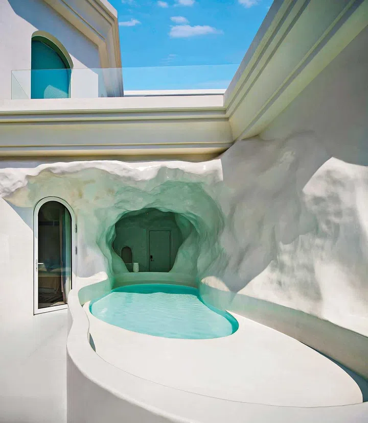 Manmade cave
pools are a
feature of this
homestay.