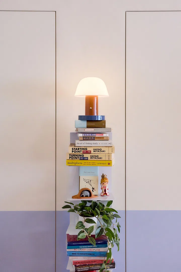 Freestanding shelf in a 5-room HDB flat in Yishun, designed by Homely Matters Pte Ltd.