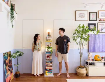 Homeowners Terence Chua and Zoey Lee pose for a photo in their 5-room HDB flat in Yishun, designed by Homely Matters Pte Ltd.