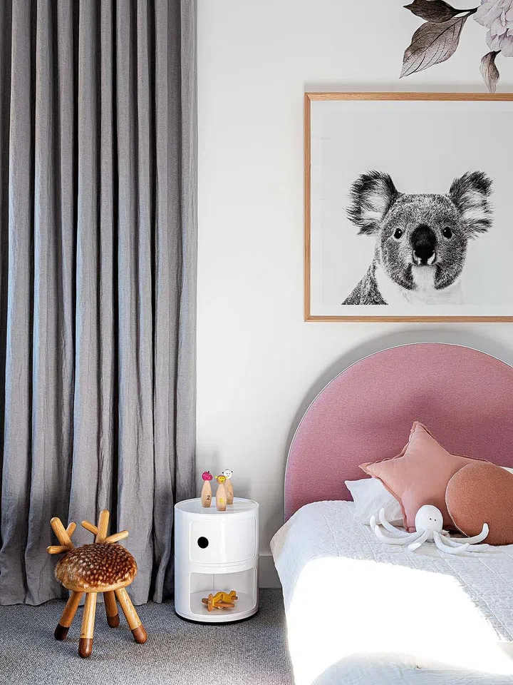 The daughter’s warm and playful bedroom.