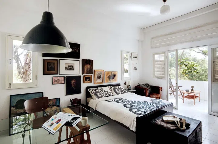 A microcosm of his varied tastes, the master bedroom is a mix of Eastern and Western elements, and old and new pieces in an easy-breezy style.