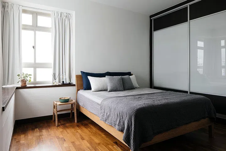 The bedroom, by contrast, is done in a muted palette for a relaxed atmosphere.